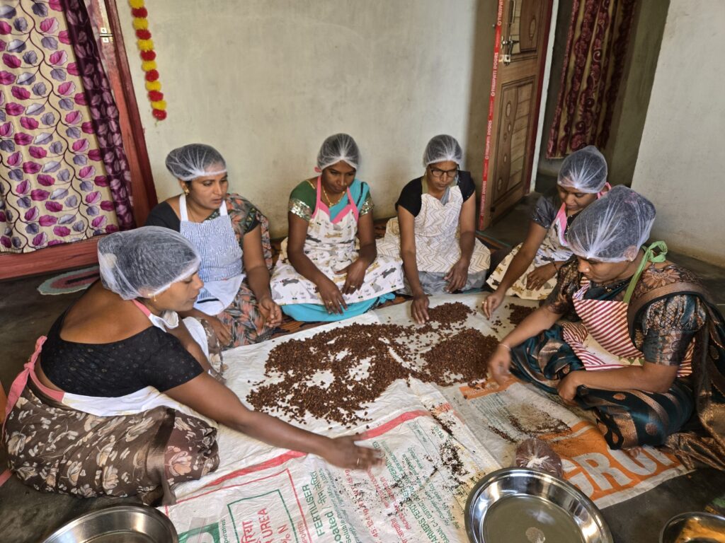Women of the SHG roll Mahua ladoos