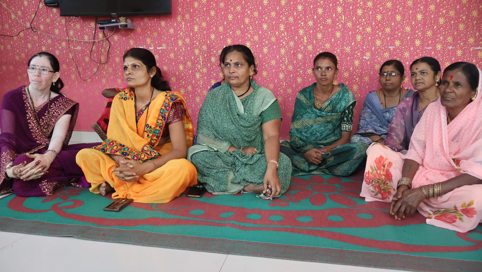 Project Garima women sitting together in a community counselling circle, Pune