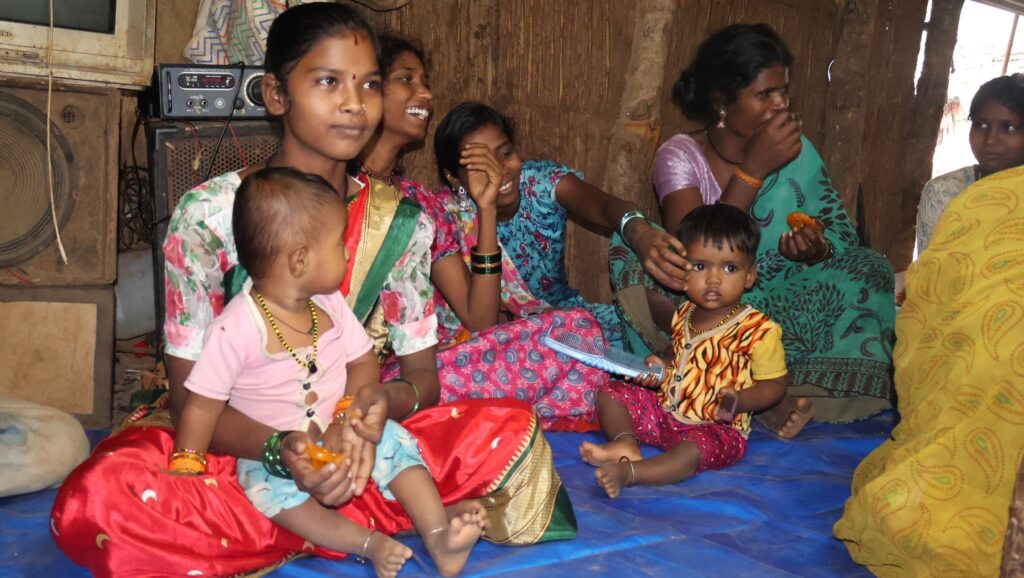 Families at the village meeting