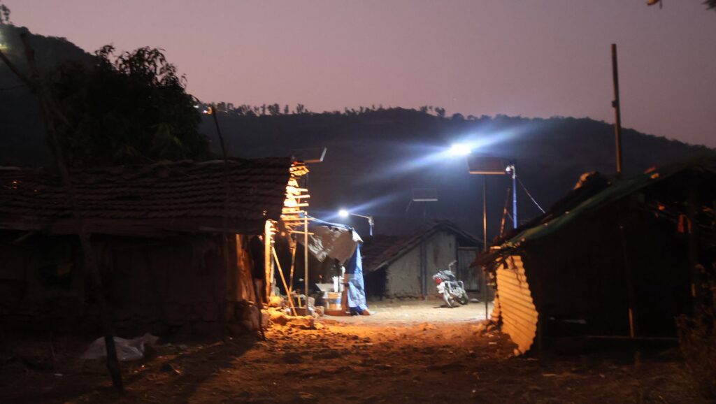 The hamlet at dusk, lights coming on